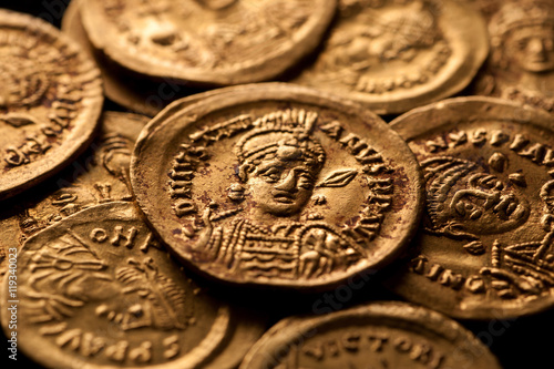 Ancient gold Byzantine coins with emperor portraits