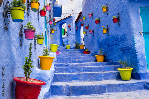 Morocco, Chefchaouen or Chaouen is most noted for its small narrow streets and neighborhoods painted in variety of vivid blue colors. Plantings in colorful pots line the narrow corridors.