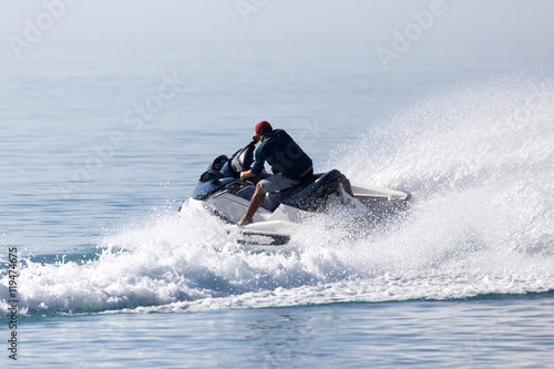 jet ski on the surface of the water at a speed of