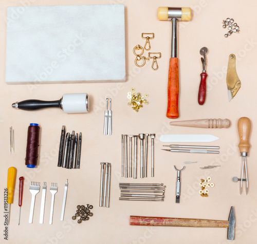 various leather craft instruments and marble board
