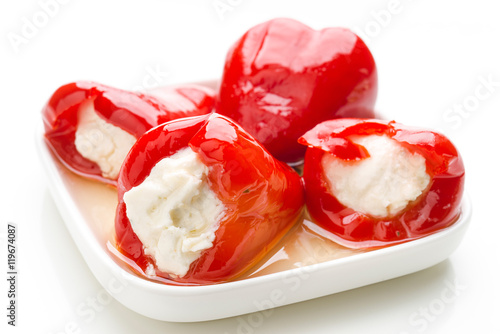 serving of marinated red peppers stuffed with cheese