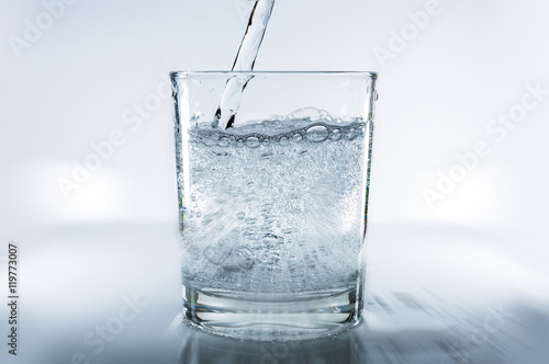 fresh, sparkling mineral water in a glass 