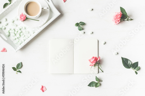 Cup of coffee and rose flowers. Morning. Vintage. Flat lay, top view