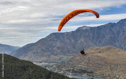 Tandem paragliding over Lake Wakatipu in Queenstown, New Zealand