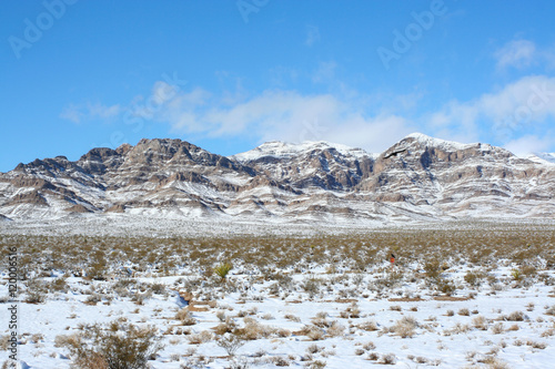 Nevada Mountains Along Highway 15. Snow capped mountain tops as seen along US interstate 15, between Jean and Primm, Nevada. Shot the morning after a rare blizzard hit the area December, 18, 2008.