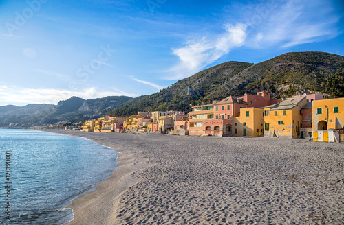 Colorful fisherman's houses on the sand beach lagoon on italian Riviera in Varigotti, Savona, Liguria, Italy