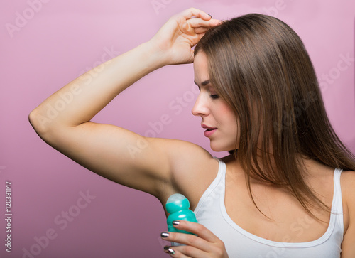 Woman with a deodorant