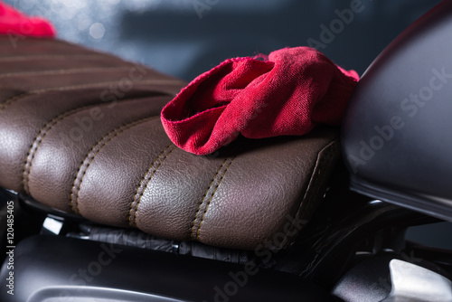Motorcycles detailing series : Red cloth on vintage motorcycle seat