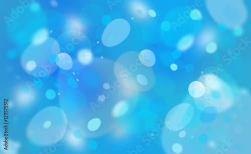 Abstract blurred shiny circle shapes on bright blue background.