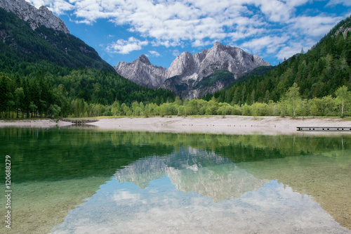 View of the Julian Alps from Kranjska Gora with Jasna Lake in Sl