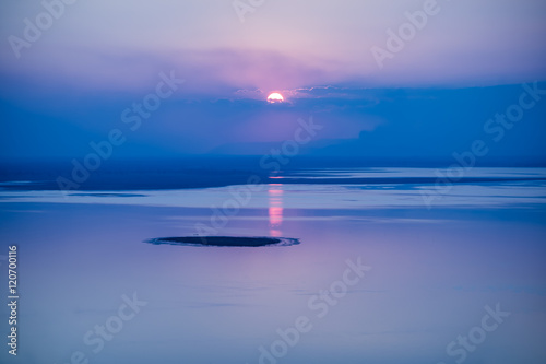 Fantastic seascape with cool sunset background with reflection on sea