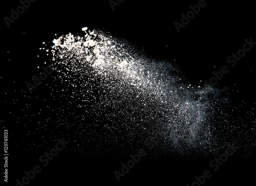 Flour on black background,Motion blur