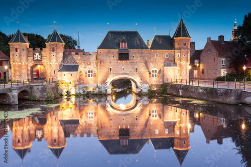 Koppelpoort medieval Dutch fortress city Amersfoort at night, Netherlands