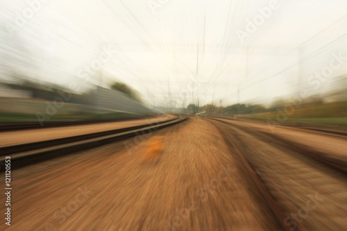railway tracks photographed with a fast moving train