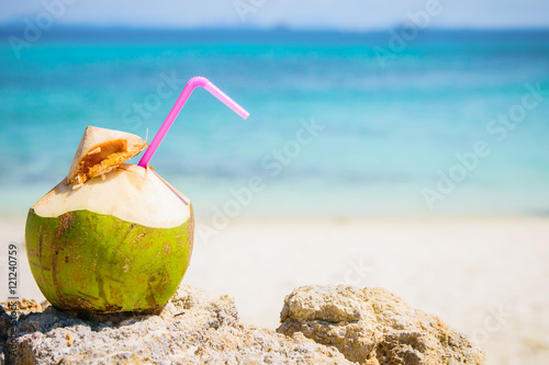 Coconut cocktai on a tropical beach