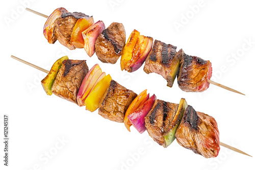 Skewer set of red meat and vegetables, isolated on white background.