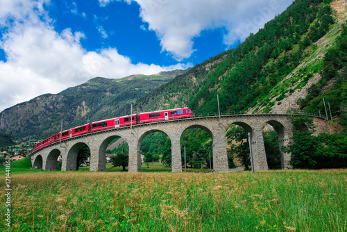 Swiss mountain train Bernina Express Cross the bridge in the cir
