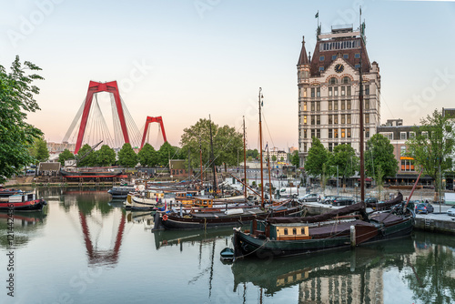 Rotterdam City, Oude Haven oldest part of the harbour, historic ship yard dock, Old Ship, Openlucht Binnenvaart Museum, Haringvliet and the Willemsbrug bridge at Dusk in Summer, Netherlands