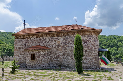 View of inner yard with old medieval church in restored Montenegrin or Giginski monastery St. St. Cosmas and Damian, mountain Kitka, Breznik, Pernik region, Bulgaria