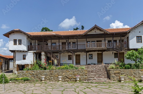 View of inner part yard with old monastic house in restored Montenegrin or Giginski monastery St. St. Cosmas and Damian, mountain Kitka, Breznik, Pernik region, Bulgaria 