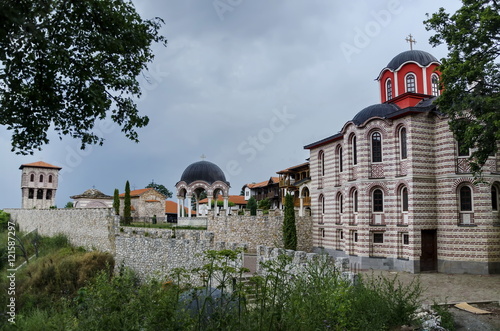 General view of inner yard in restored Montenegrin or Giginski monastery St. St. Cosmas and Damian, mountain Kitka, Breznik, Pernik region, Bulgaria 