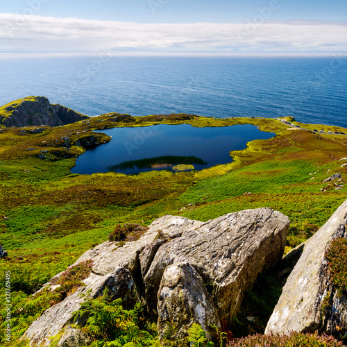  lake and sea. Irish landscape with rocks. County Donegal. Ireland