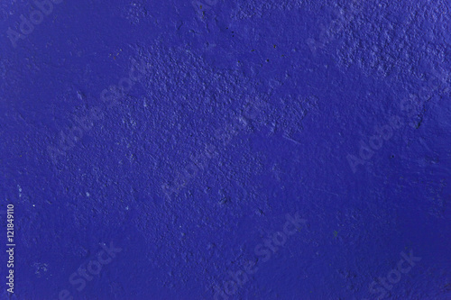 Indigo blue wall of concrete with texture