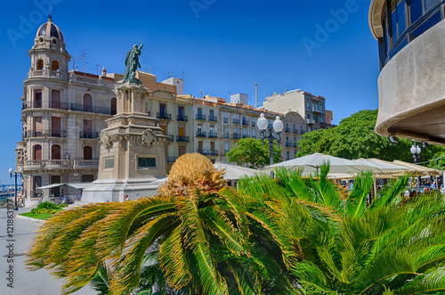 Palm trees and statue on Mediterranean balcony in Tarragona, Spain