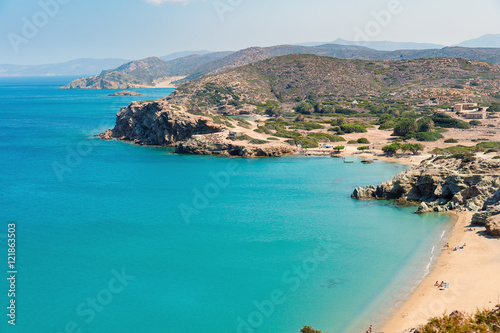 Sandy beach and lagoon with clear blue water at Crete island near Sitia town