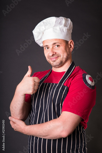 Portrait of a cook man in the studio