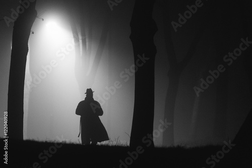 Detective on his way through the pitch dark