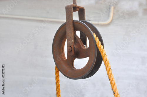 Iron pulley with rope.