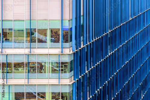 Modern office building with blue fin pattern