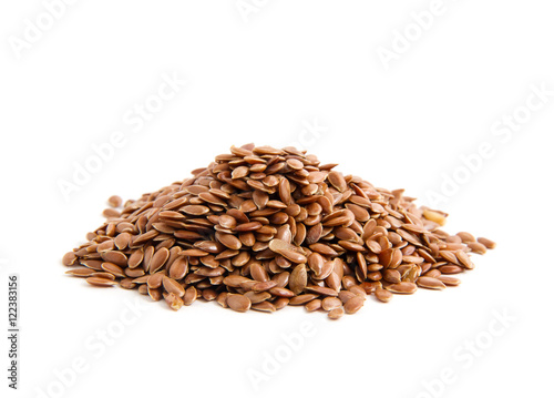 Flax seeds heap isolated on white