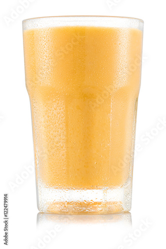 Banana and peach smoothie in glass