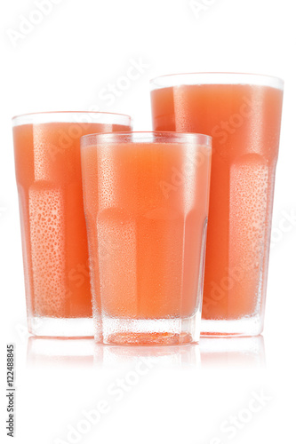 Grapefruit juice in three size of glass