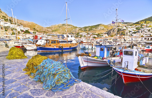 port with fishing boats and nets at Hydra island Greece