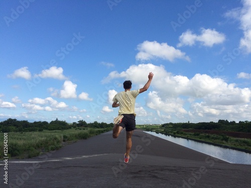 Man running away fast downhill