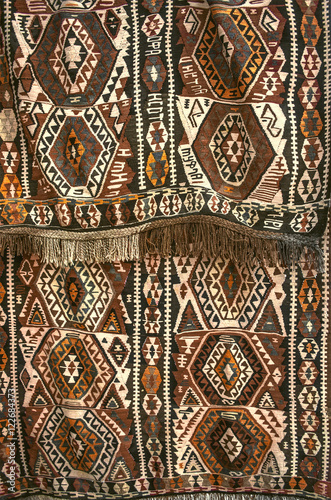 Large ancient lint-free oriental carpet with folk geometrical pattern 