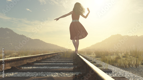 A walking girl on the railway