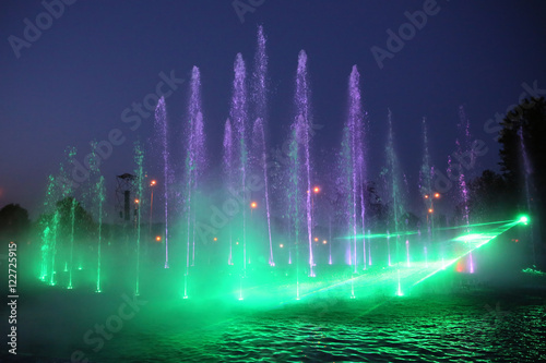 The evening fountain show in a beautiful city