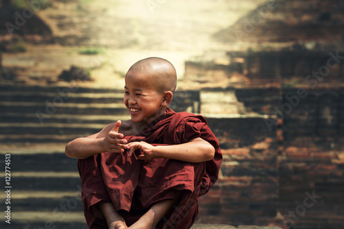 Smiling young Buddhist monk
