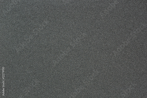 Gray monotone grain texture. Glitter sand background.