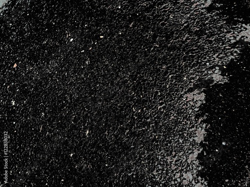 Black with gray asphalt. Pavement.