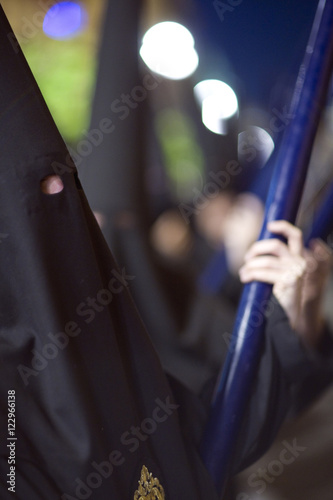 Closeup of penitents bearing candles, Holy Week 2008, Seville, Spain