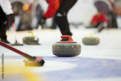 Curling stones on ice 