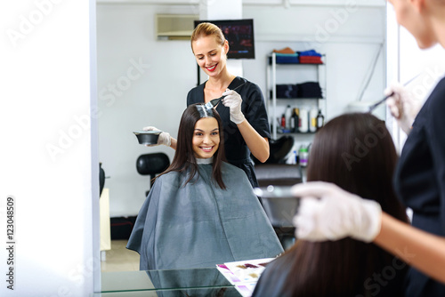 hairdresser working in front of a mirror