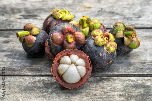 Thai fruit, fresh mangosteen on wood table.