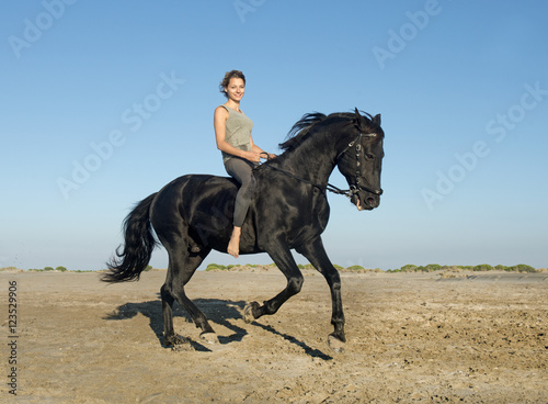 horsewoman on the beach