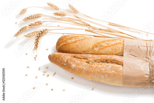 Loaves of french baguette bread tied together with paper and str